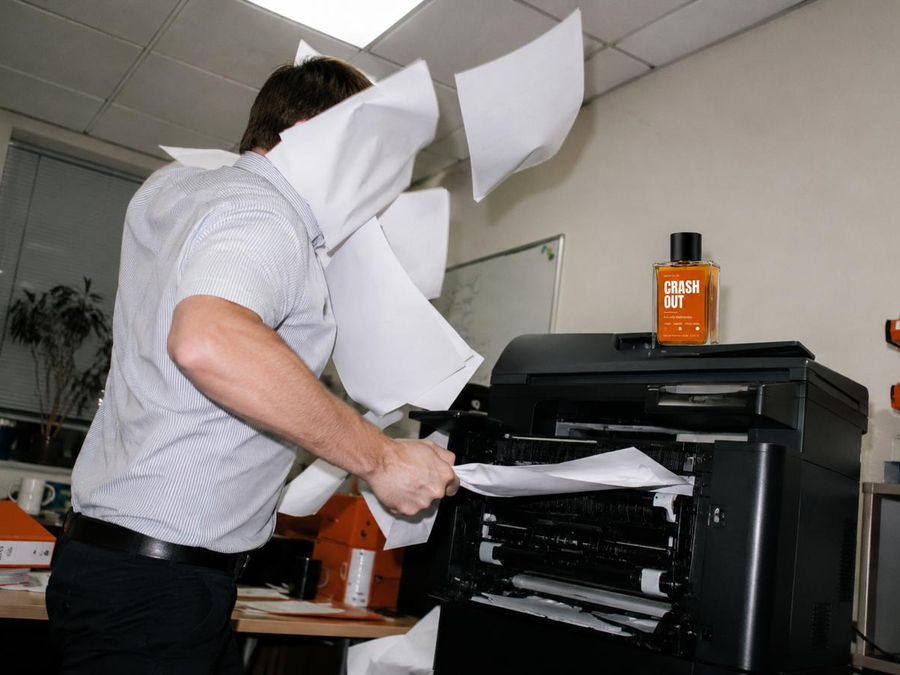 Fighting a printer erupting with paper